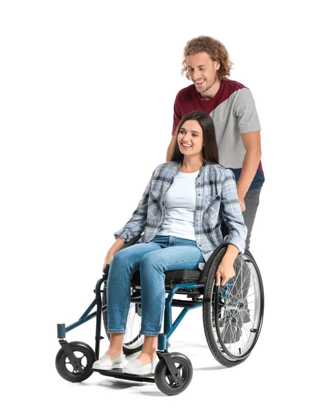 Happy woman in wheelchair and with husband on white background — Stock Photo, Image