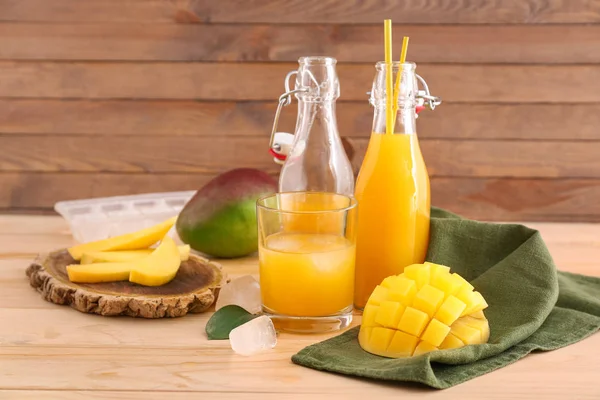 Composition with tasty mango juice on table — Stock Photo, Image