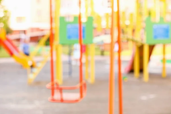 Blurred view of playground in park — Stock Photo, Image