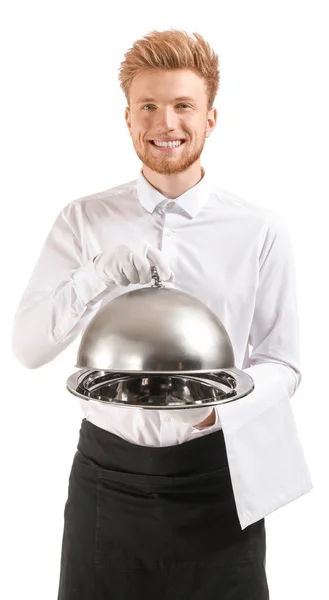 Handsome waiter with tray and cloche on white background — Stock Photo, Image