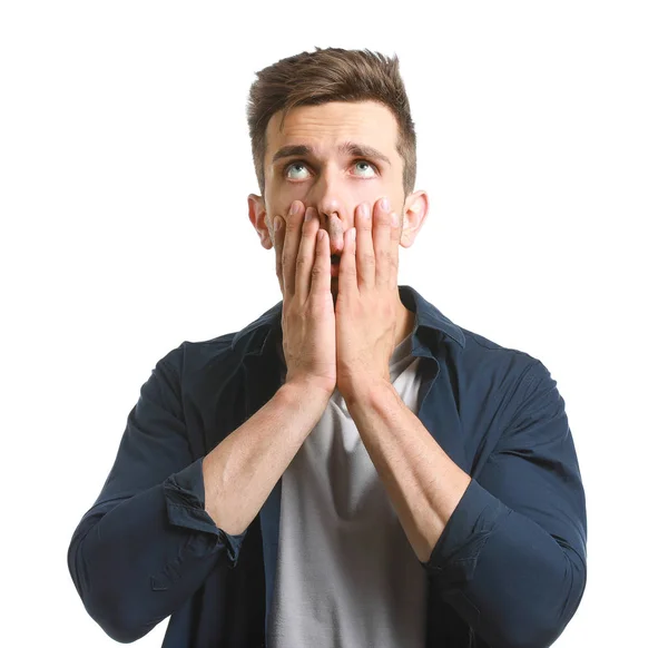 Stressé jeune homme sur fond blanc — Photo