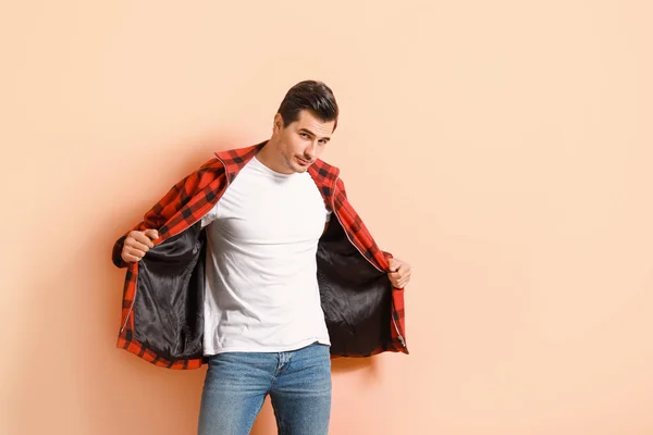 Stylish fashionable man on color background — Stock Photo, Image