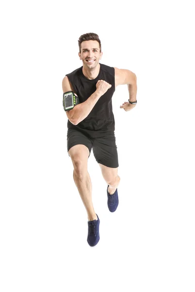 Correndo desportivo homem no fundo branco — Fotografia de Stock