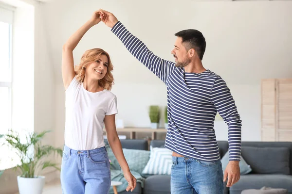 Happy dancing couple at home — Stock Photo, Image