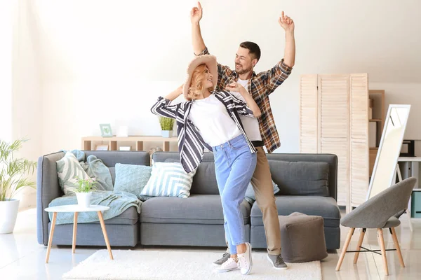 Happy dancing couple at home — Stock Photo, Image