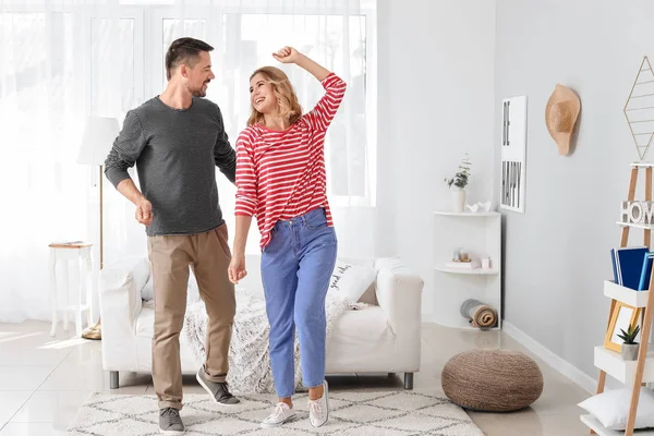 Happy dancing couple at home — Stock Photo, Image
