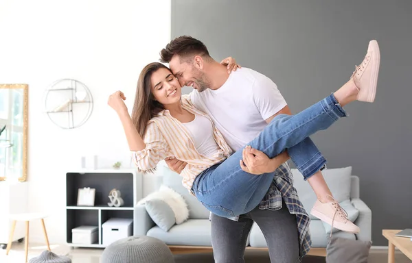 Happy young couple at home — Stock Photo, Image