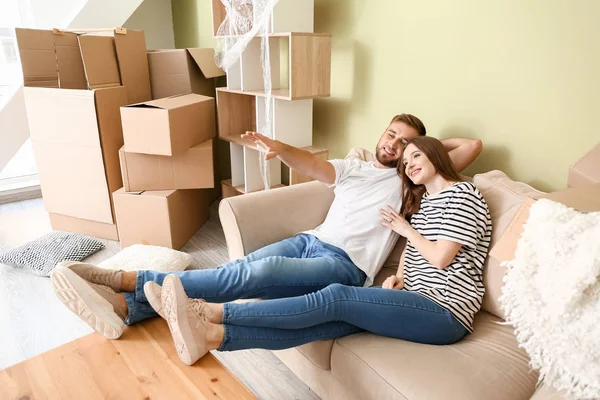 Young couple planning design of their new house — Stock Photo, Image