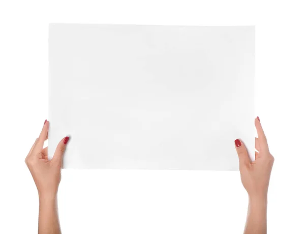 Frauenhände mit leerem Blatt Papier auf weißem Hintergrund — Stockfoto