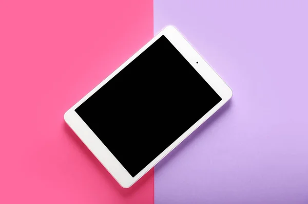 Modern tablet computer on color background — Stock Photo, Image