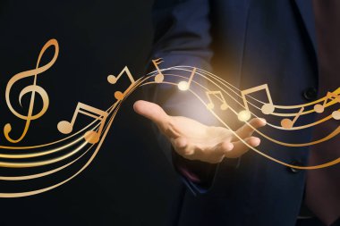 Koyu arka plan, closeup çizilmiş müzik personeli ile Erkek besteci