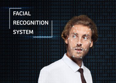 Karanlık arka planda yüz taraması ile yakışıklı işadamı