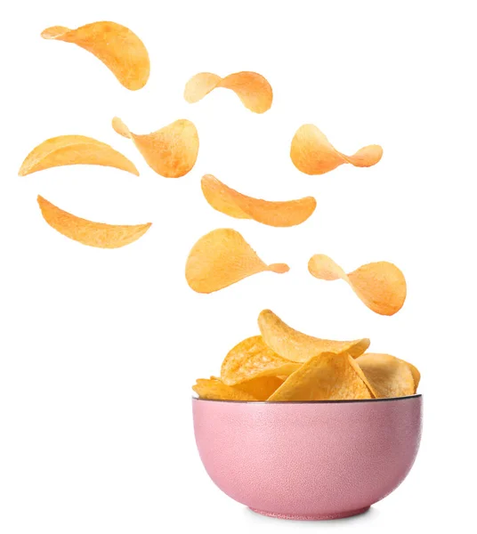 Bowl with tasty crispy potato chips on white background — Stock Photo, Image