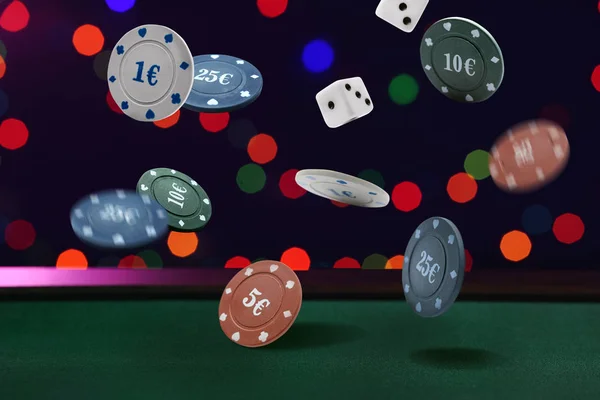 Falling chips with dices in casino — Stock Photo, Image