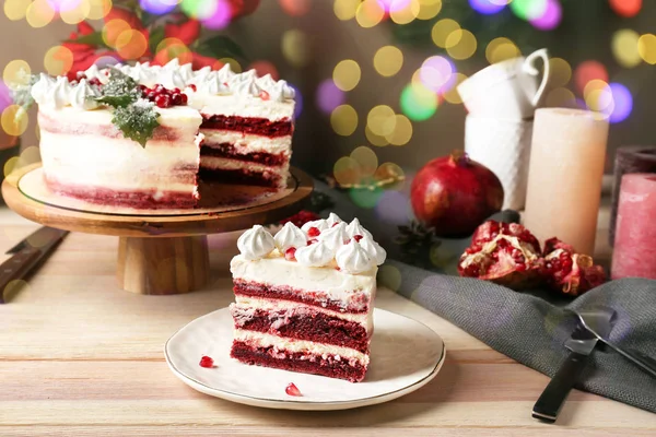 Piece of tasty Christmas cake on wooden table — Stock Photo, Image