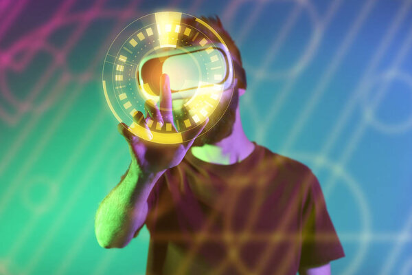 Man wearing VR glasses and using virtual screen on dark color background — Stock Photo, Image