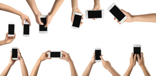 Many female hands with modern smartphones on white background — Stock Photo, Image