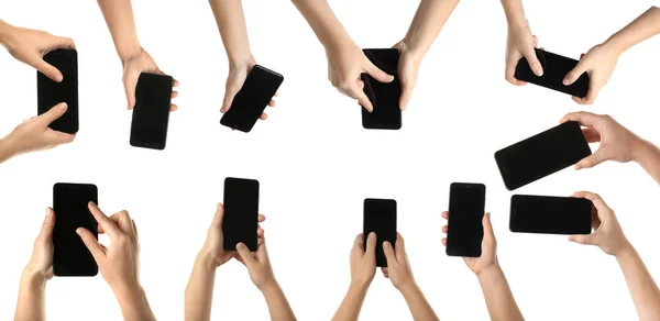 Many female hands with modern smartphones on white background — Stock Photo, Image