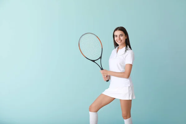 Beautiful tennis player on color background — Stock Photo, Image