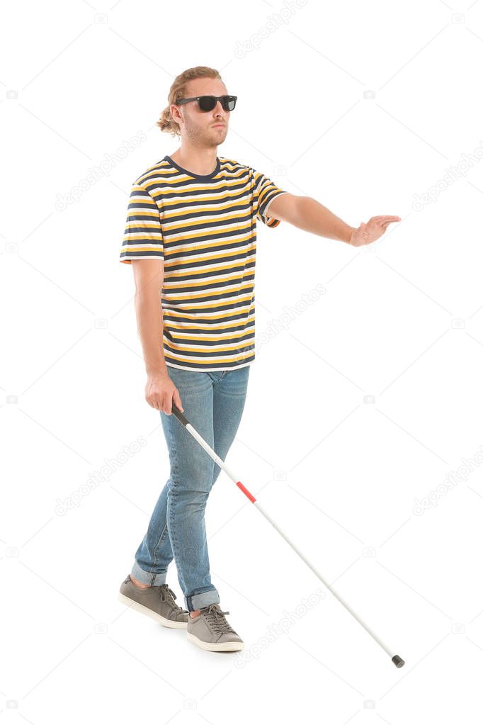 Blind young man on white background