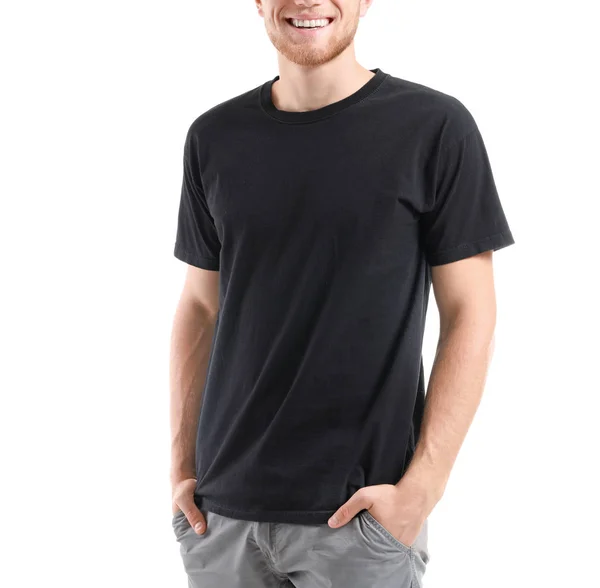 Mann im stylischen T-Shirt auf weißem Hintergrund — Stockfoto