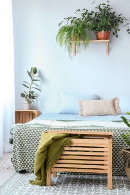 Ev bitkileri ile modern yatak odası Iç