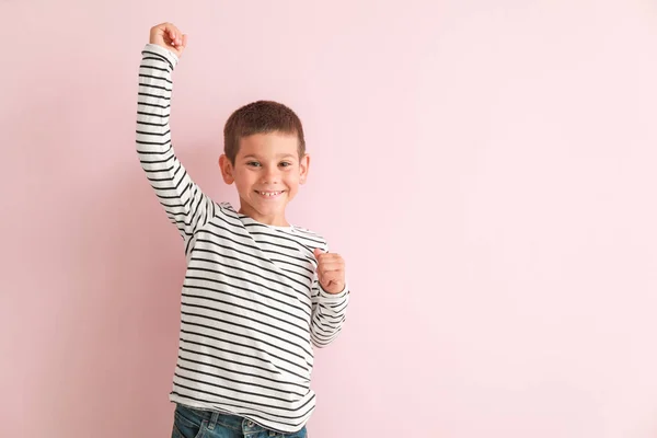 Portrait of happy little boy on color background — Stock Photo, Image