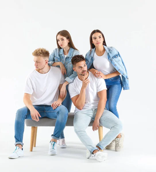 Group of young people in stylish casual clothes on white background — Stock Photo, Image