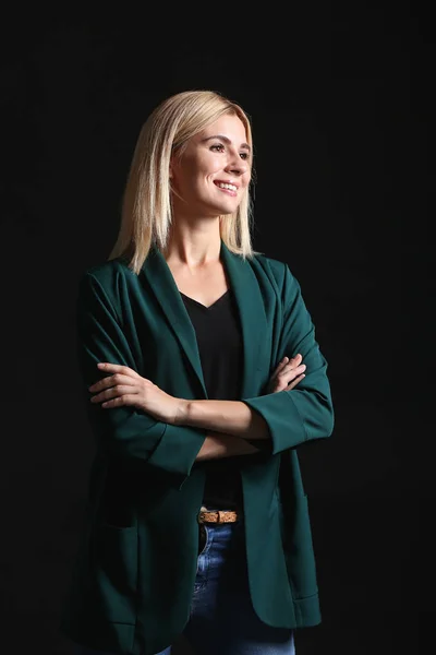 Beautiful stylish businesswoman on dark background — Stock Photo, Image