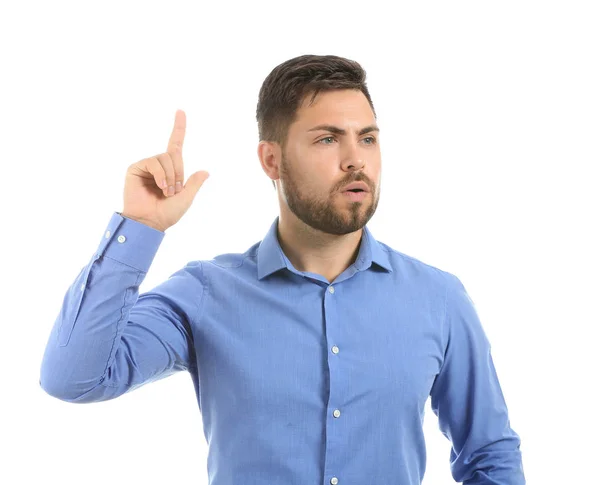 Portrait of businessman with raised index finger on white background — Stock Photo, Image