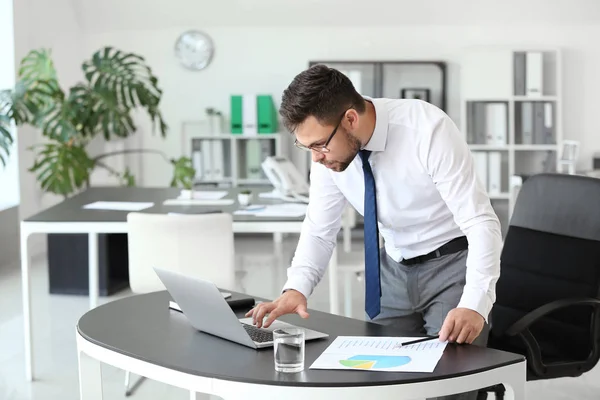 Portrait of businessman working in office — Stock Photo, Image