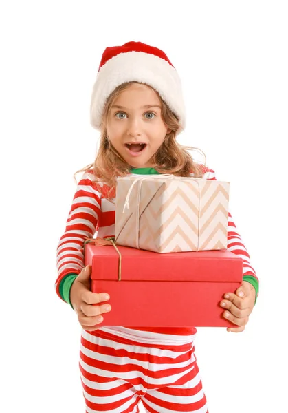 Surprised little girl with Christmas gifts on white background — Stock Photo, Image