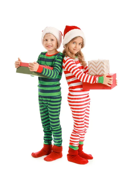 Cute little children with Christmas gifts on white background — Stock Photo, Image