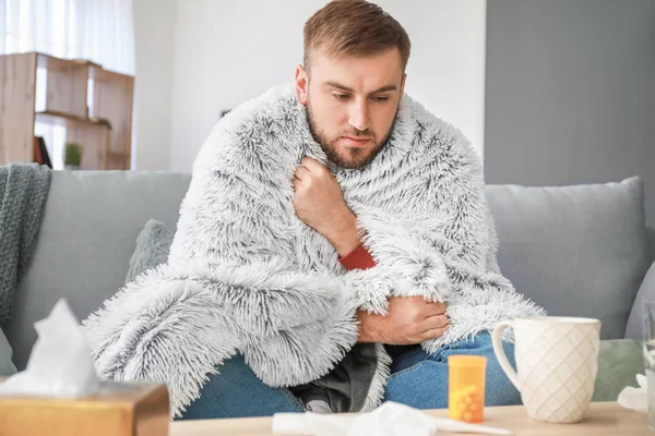 Man ill with flu at home