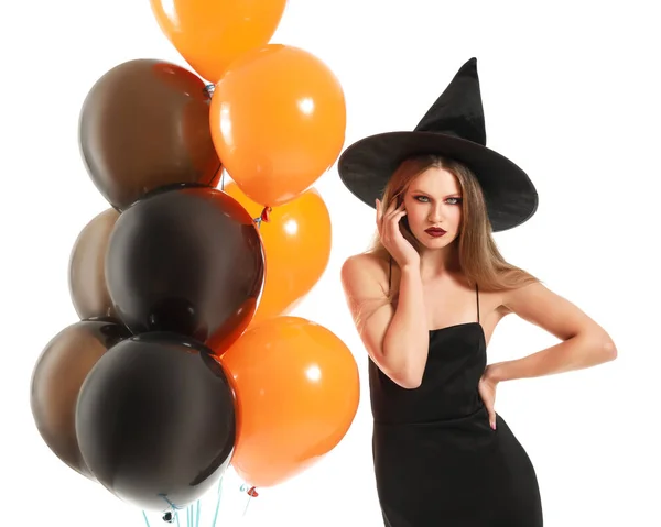 Mooie vrouw verkleed als heks voor Halloween op witte achtergrond — Stockfoto
