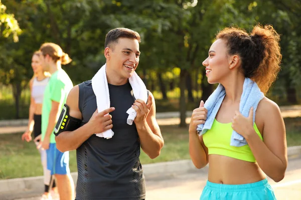 Sporty young people after training outdoors — Stock Photo, Image