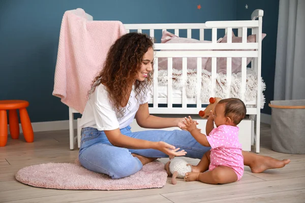 African-American woman with her little baby at home — Stock Photo, Image