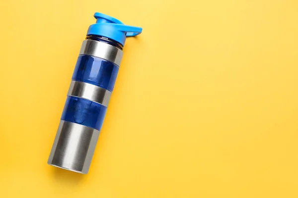 Sports water bottle on color background — Stock Photo, Image