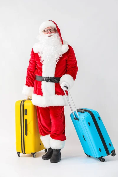 Santa Claus with luggage on white background — Stock Photo, Image