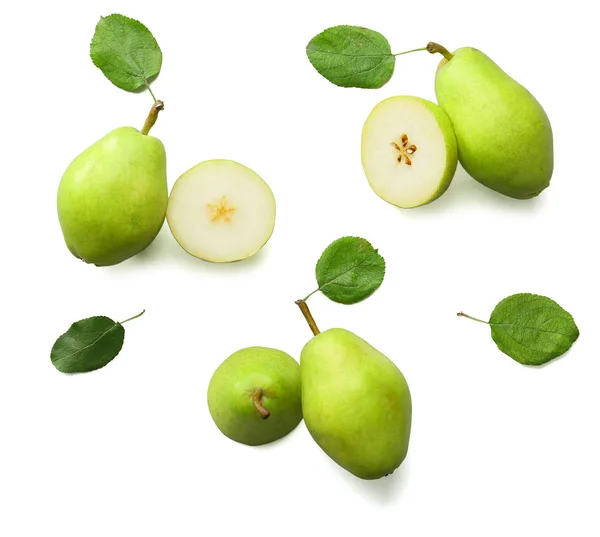 Tasty fresh pears with leaves on white background — Stock Photo, Image
