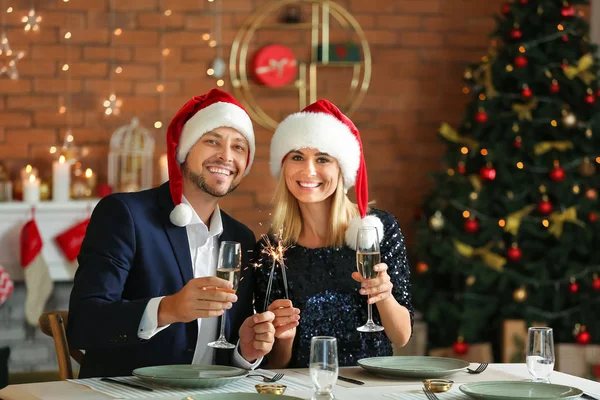 Happy couple celebrating Christmas at home — Stock Photo, Image