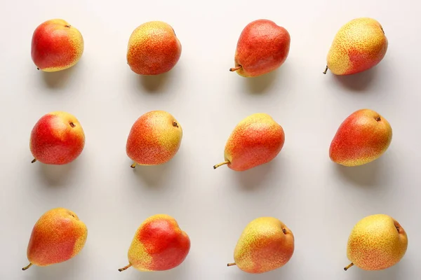 Sweet ripe pears on light background — Stock Photo, Image