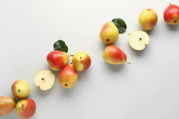 Sweet ripe pears on light background — Stock Photo, Image