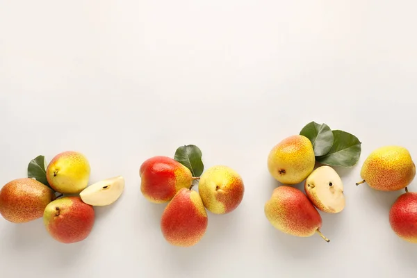 Sweet ripe pears on light background — Stock Photo, Image