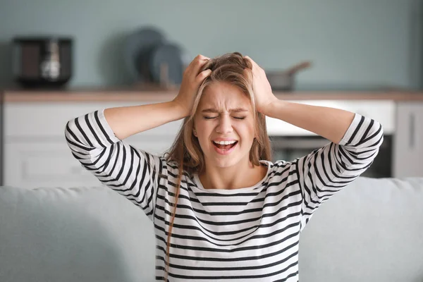 Portrait of stressed woman at home — Stock Photo, Image