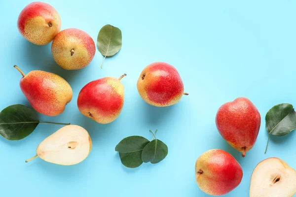 Sweet ripe pears on color background — Stock Photo, Image