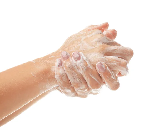 Tangan wanita dengan busa sabun di latar belakang putih — Stok Foto