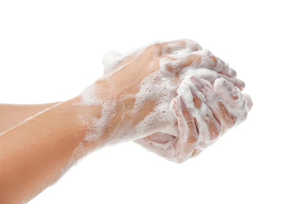 Manos femeninas con espuma de jabón sobre fondo blanco —  Fotos de Stock