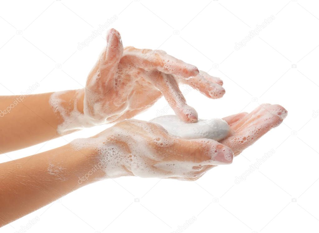 Washing of hands with soap on white background