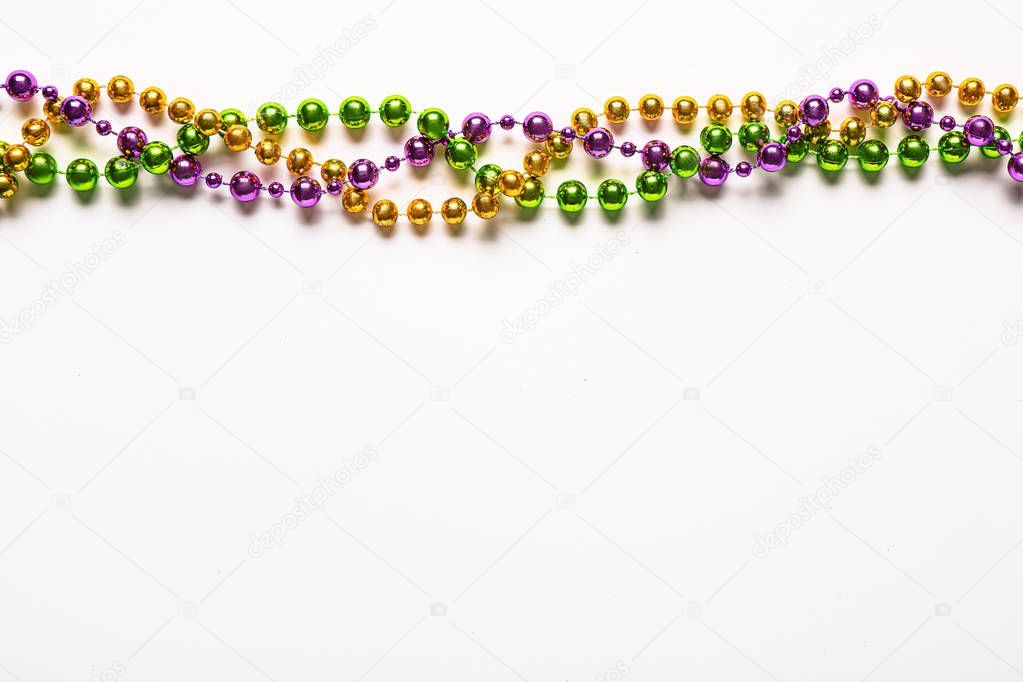 Colorful beads on white background